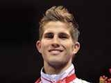 France's Alexis Vastine celebrates his Light welterweight (64 kg) bronze medal, on August 23, 2008 at the Beijing 2008 Olympic Games