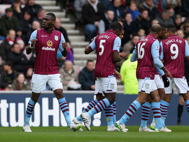Christian Benteke of Aston Villa celebrates scoring the opening goal during the Barclays Premier League match between Sunderland and Aston Villa at Stadium of Light on March 14, 2015