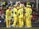 Mitchell Starc celebrates with Australia teammates on the way to defeating Scotland in the World Cup on March 14, 2015