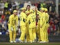Mitchell Starc celebrates with Australia teammates on the way to defeating Scotland in the World Cup on March 14, 2015