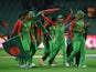 Bangladesh celebrate after winning the 2015 ICC Cricket World Cup match between England and Bangladesh at Adelaide Oval on March 9, 2015