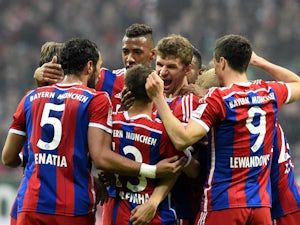 Half-Time Report: Muller, Alaba give Bayern lead