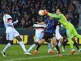 Besiktas' goalkeeper Cenk Gonen saves his goal during in the UEFA Europa League round of 16 match between Club Brugge KV and Besiktas JK in Bruges on March 12, 2015