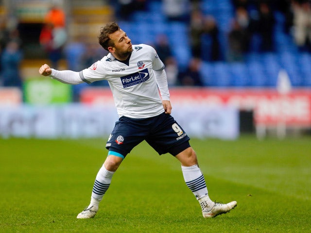Adam Le Fondre of Bolton celebrates after scoring his second goal during the Sky Bet Championship match between Bolton Wanderers and Millwall at the Macron Stadium on March 14, 2015