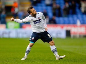 Adam Le Fondre of Bolton celebrates after scoring his second goal during the Sky Bet Championship match between Bolton Wanderers and Millwall at the Macron Stadium on March 14, 2015