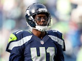 Byron Maxwell #41 of the Seattle Seahawks looks on against the Green Bay Packers during the 2015 NFC Championship game at CenturyLink Field on January 18, 2015