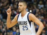Chandler Parsons #25 of the Dallas Mavericks reacts after being fouled against the Washington Wizards at American Airlines Center on December 30, 2014