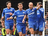 Chelsea's Brazilian player Alex celebrates scoring his opening goal with German midfielder Michael Ballack, Serbian defender Branislav Ivanovic, and Ivorian striker Didier Drogba during the English Premier League football match between Chelsea and West Ha