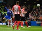 Diego Costa of Chelsea heads in the opening goal during the Barclays Premier League match between Chelsea and Southampton at Stamford Bridge on March 15, 2015