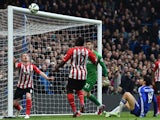 Southampton's Northern Irish midfielder Steven Davis watches as Chelsea's Brazilian-born Spanish striker Diego Costa's effort comes back off the post during the English Premier League football match between Chelsea and Southampton at Stamford Bridge in Lo