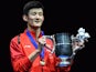 China's Chen Long poses with his trophy following victory over Denmark's Jan Jorgensen in their All England Open Badminton Championships men's singles final match in Birmingham, central England, on March 8, 2015