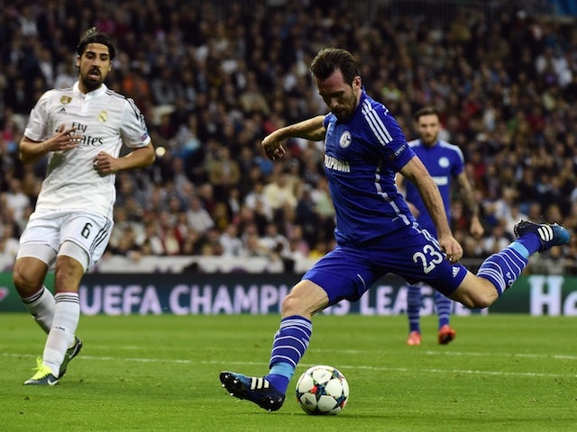 Schalke's Austrian defender Christian Fuchs (R) kicks and scores during the UEFA Champions League round of 16 second leg football match against Real Madrid  on March 10, 2015