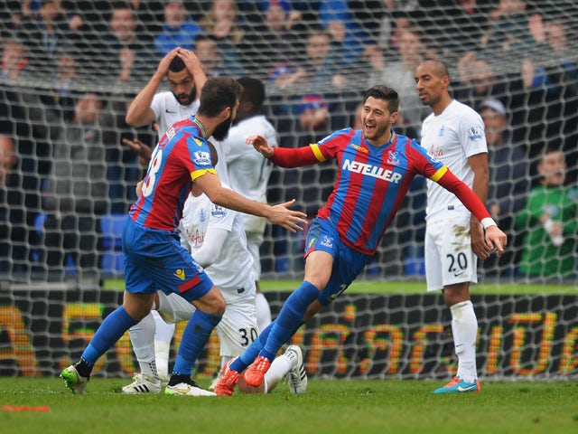 Joel Ward of Crystal Palace celebrates scoring his team's third goal with Joe Ledley during the Barclays Premier League match between Crystal Palace and Queens Park Rangers at Selhurst Park on March 14, 2015