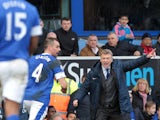 Everton's Scottish manager David Moyes instructs his players during an English Premier League football match between Everton and Manchester City at the Goodison Park Stadium in Liverpool, north west England, on March 16, 2013