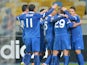 FC Dnipro Dnipropetrovsk players react after scoring a goal against AFC Ajax during their Europa League Round of 16 match in Kiev on March 12, 2015