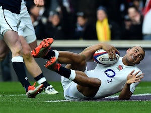 England's centre Jonathan Joseph scores the opening try of the Six Nations international rugby union match between England and Scotland at Twickenham Stadium, south west of London on March 14, 2015