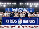 The England team celebrate with the Calcutta Cup during the RBS Six Nations match between England and Scotland at Twickenham Stadium on March 14, 201