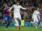 Gareth Bale (R) of Real Madrid CF competes for the ball with Simao Mate Junios (L) of Levante UD during tha La Liga match on March 15, 2015
