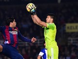 Luis Suarez of FC Barcelona competes for the ball with the goalkeeper Geronimo Rulli of Real Sociedad during the La Liga match between Real Sociedad de Futbol and FC Barcelona at Estadio Anoeta on January 4, 2015