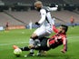 Guingamp's French defender Baissama Sankoh vies with Nice's French forward Neal Maupay during the French L1 football match between Nice and Guingamp on March 13, 2015