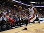 Hassan Whiteside #21 of the Miami Heat saves the ball from going out of bounds during a game against the Atlanta Hawks at American Airlines Arena on February 28, 2015