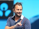 Henri Leconte of France in action in their legends doubles match during day seven of the 2015 Australian Open at Melbourne Park on January 25, 2015