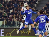 Sassuolo's defender from Croatia Sime Vrsaljko fights for the ball with Juventus' midfielder Paul Pogba during the Serie A football match Juventus vs Sassuolo at 'Juventus Stadium' in Turin on March 09, 2015