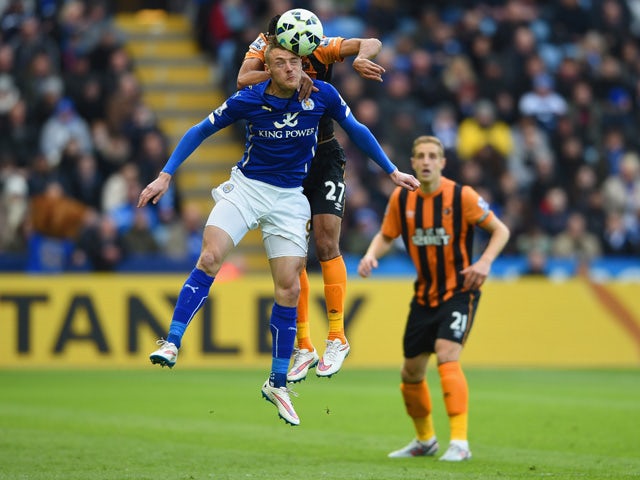 Ahmed Elmohamady of Hull City climbs above Jamie Vardy of Leicester City to head the ball during the Barclays Premier League match between Leicester City and Hull City at The King Power Stadium on March 14, 2015