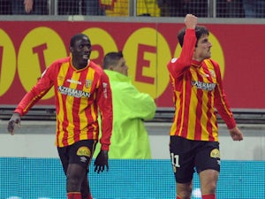 Lens' Argentinian forward Pablo Chavarria celebrates after scoring during the French L1 football match between Lens and Toulouse on March 14, 2015