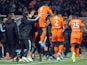 Lorient's forward Jordan Ayew is congratulated by his teammates after scoring a goal during the French L1 football match Lorient versus Caen on March 14, 2015