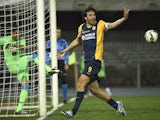 Verona's forward Luca Toni celebrates after scoring a second goal during the Italian Serie A foot ball match Hellas Verona vs Napoli on March 15, 2015