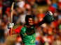 Mahmudullah of Bangladesh celebrates his century during the 2015 ICC Cricket World Cup match between Bangladesh and New Zealand at Seddon Park on March 13, 2015