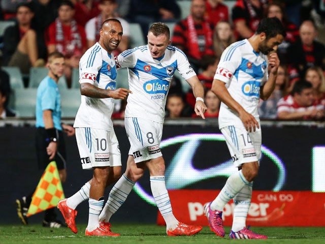 Archie Thompson of Melbourne Victory celebrates with Besart Berisha after scoring a goal during the round 21 A-League match between the Western Sydney Wanderers and Melbourne Victory at Pirtek Stadium on March 13, 2015