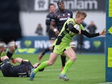 Sam Olver of Northampton Saints runs in to score a try during the LV= Cup Semi Final match between Saracens and Northampton Saints at Allianz Park on March 14, 2015