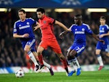 Javier Pastore of PSG is closed down by Nemanja Matic of Chelsea and Ramires of Chelsea during the UEFA Champions League Round of 16, second leg match between Chelsea and Paris Saint-Germain at Stamford Bridge on March 11, 2015
