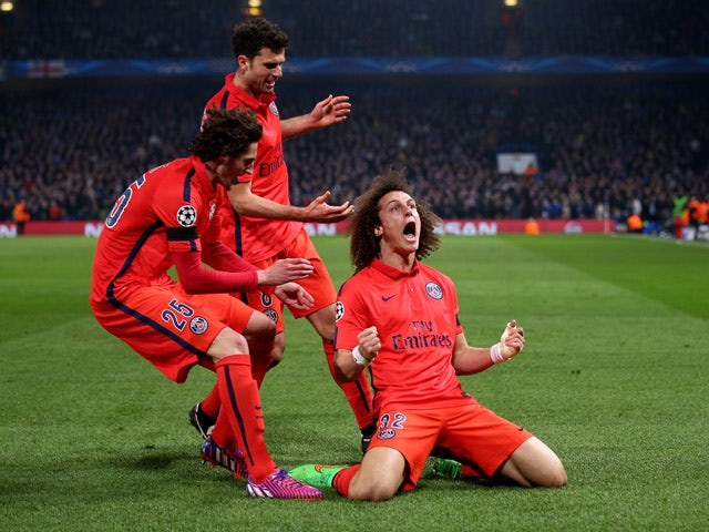 David Luiz of PSG celebrates after scoring a goal to level the scores at 1-1 during the UEFA Champions League Round of 16, second leg match between Chelsea and Paris Saint-Germain at Stamford Bridge on March 11, 2015