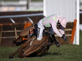 Ruby Walsh falls from Annie Power at the last when clear in The OLBG Mare' Hurdle Race at Cheltenham racecourse on March 10, 2015