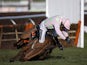 Ruby Walsh falls from Annie Power at the last when clear in The OLBG Mare' Hurdle Race at Cheltenham racecourse on March 10, 2015