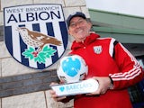 Tony Pulis with the manager of the month award for February 2015