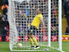 Troy Deeney of Watford celebrates Watford's first goal during the Sky Bet Championship match between Watford and Reading at Vicarage Road on March 14, 2015