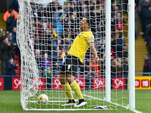 Troy Deeney of Watford celebrates Watford's first goal during the Sky Bet Championship match between Watford and Reading at Vicarage Road on March 14, 2015