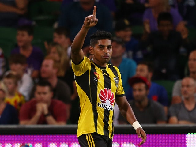 Roy Krishna of the Phoenix signals to the bench after scoring the winning goal during the round 21 A-League match between the Perth Glory and the Wellington Phoenix at nib Stadium on March 14, 2015 
