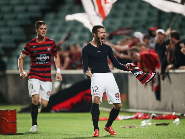 Nikita Rukavytsya of the Wanderers celebrates scoring the winning goal during the round 21 A-League match between the Western Sydney Wanderers and Melbourne City FC at Pirtek Stadium on March 11, 2015