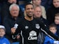 Everton's English midfielder Aaron Lennon (L) celebrates scoring the second goal for his team during the English Premier League football match against Queens Park Rangers on March 22, 2015
