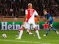 Aaron Ramsey of Arsenal (R) scores their second goal during the UEFA Champions League round of 16 second leg match between AS Monaco and Arsenal at Stade Louis II on March 17, 2015