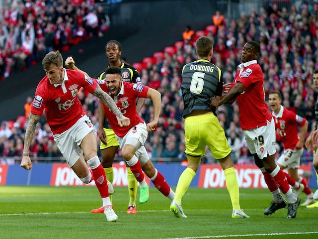 Aden Flint of Bristol City reacts after scoring during the Johnstone's Paint Trophy Final between Bristol City and Walsall at Wembley Stadium on March 22, 2015