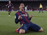 Barcelona's Uruguayan forward Luis Suarez celebrates his goal during the 'clasico' Spanish league football match FC Barcelona vs Real Madrid CF at the Camp Nou stadium in Barcelona on March 22, 2015