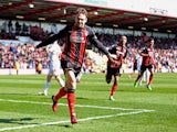 Brett Pitman of Bournemouth celebrates after scoring his team's third goal of the game during the Sky Bet Championship match between AFC Bournemouth and Middlesbrough at Goldsands Stadium on March 21, 2015