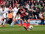 Yann Kermorgant of Bournemouth scores the opening goal of the game from the penalty spot during the Sky Bet Championship match between AFC Bournemouth and Middlesbrough at Goldsands Stadium on March 21, 2015