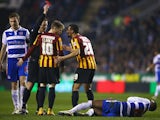 Referee Mike Jones shows the red card to Filipe Morais of Bradford City during the FA Cup Quarter Final Replay match between Reading and Bradford City at Madejski Stadium on March 16, 2015 